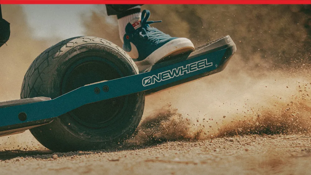SOLIDWORKS's customer Future Motion's Onewheel motorized skateboard in action on a dirt surface