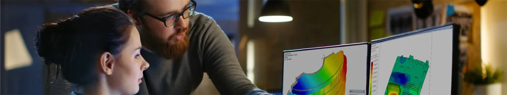 People collaborating on 3D models showing simulation data