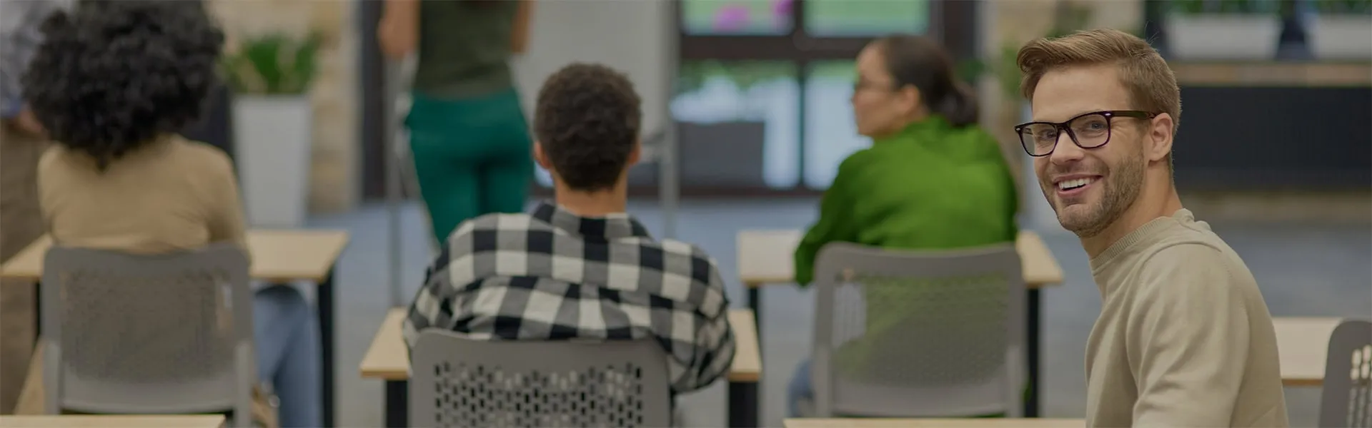 Student in class looking back at the camera - SOLIDWORKS