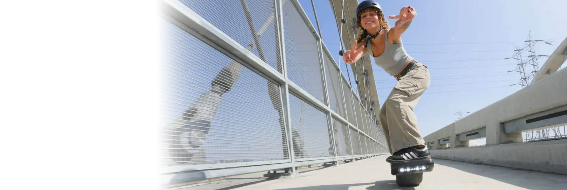 Woman riding a Onewheel skateboard by Future Motion, a SOLIDWORKS customer