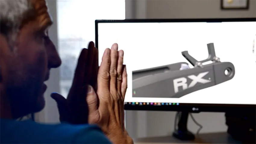 Bowhead Designers discuss 3D model of part on screen - SOLIDWORKS