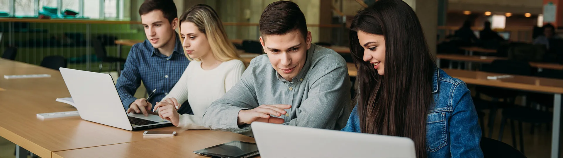 Students discussing work - SOLIDWORKS